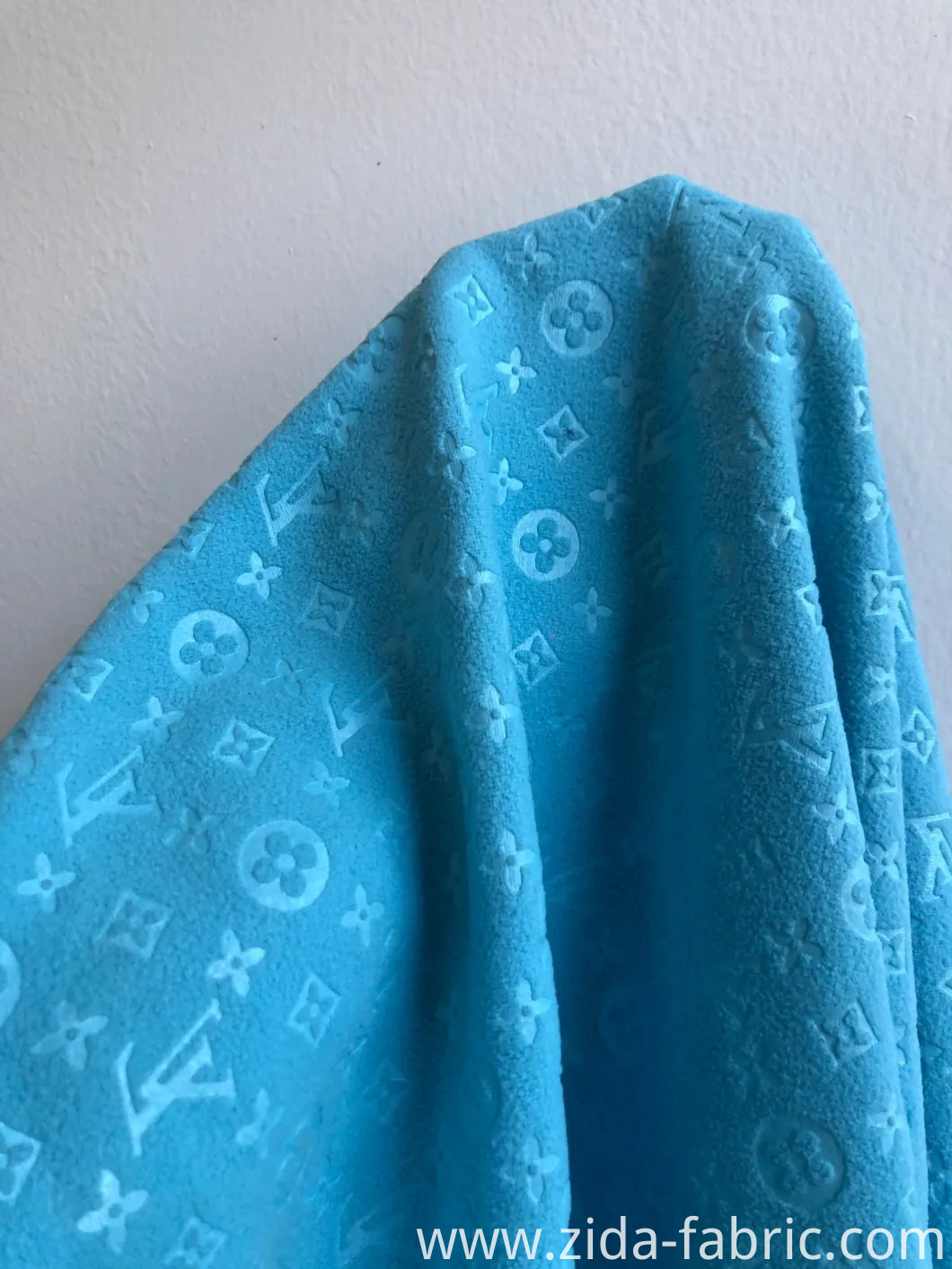 100%Polyester DTY150d/144f Double Side Brush One Side Antipilling Polar Fleece with Embossed
